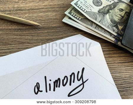 Payments Alimony. White Envelope With Sign Alimony And Money.