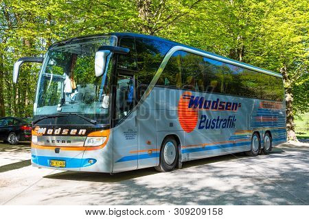 Liselund Denmark - May 5. 2018: Tourist Bus At The Parking Lot In Liselund Park