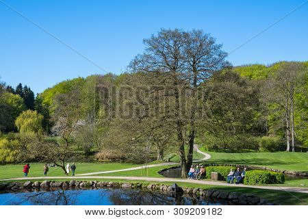 Liselund Denmark - May 5. 2018: People Walking In The Park At Liselund Palace In Denmark On A Sunny 