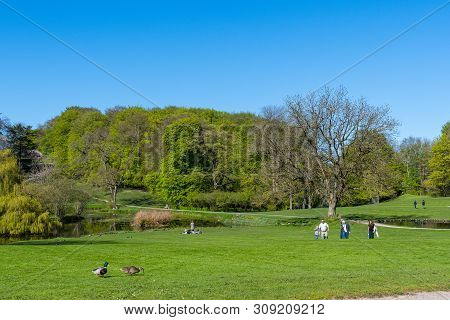 Liselund Denmark - May 5. 2018: People Walking In The Park At Liselund Palace In Denmark On A Sunny 