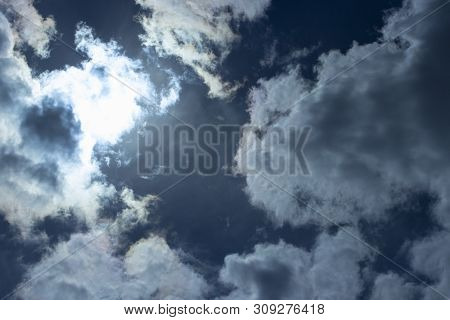 The Suns Rays Make Their Way Through The Storm Clouds. Dark Rain Clouds, Stormy Sky, Storm Hurricane
