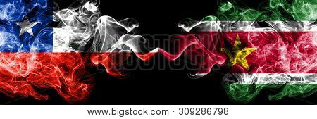 Chile Vs Suriname, Surinamese Smoky Mystic Flags Placed Side By Side. Thick Colored Silky Smokes Com