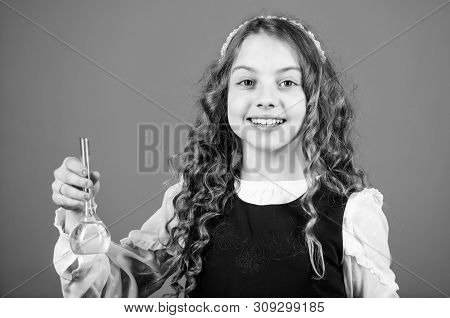 Small Girl Scientist With Testing Flask. Child Study Bilogy Lesson. Science Research In Lab. Small S