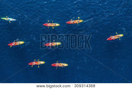 Croatia. Kayks At The Sea Surface. Aerial View Of Kyaks On Blue Adriatic Sea At Sunny Day. Adventure