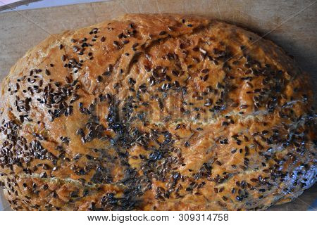 Beautiful Very Hearty Bread Homemade Recipe. Brown Bread With Crispy Crust, Black Caraway Seeds And 