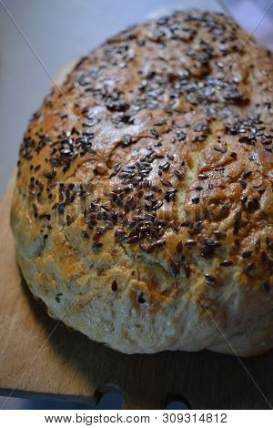 Beautiful Very Hearty Bread Homemade Recipe. Brown Bread With Crispy Crust, Black Caraway Seeds And 