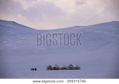 Sunrise In The Mountains. Yurt Town On The Lake Son-kul.