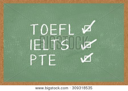 Word Toefl, Ielts, Pte , With Boxes To Tick On Green Chalkboard Background. Test Of English As A For
