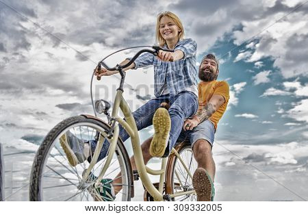 Bike Rental Or Bike Hire For Short Periods Of Time. Couple With Bicycle Romantic Date Sky Background