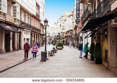 A Coruna, Spain - September 24, 2017: Tourists At The Pedestrian Street In The Centre Of A Coruna In