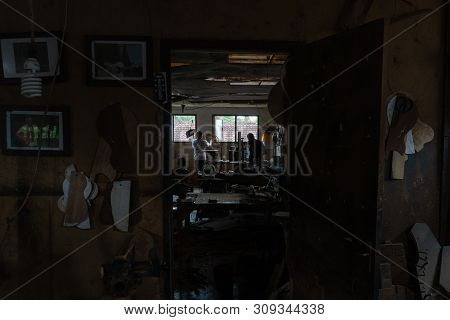 Gianyar,bali/indonesia-may 30 2019: The Guitar Craftsmen Are Working On Making Guitars In A Classica