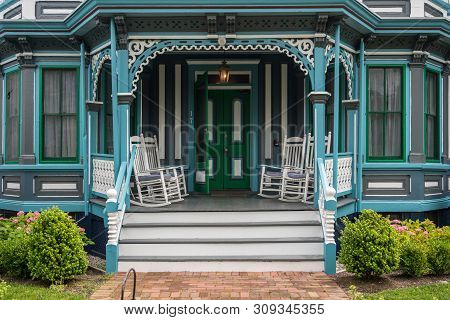 Cape May, Nj - 12 June 2019: Entrance To Victorian Painted Wooden Homes In The Historic Downtown Are