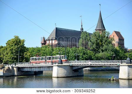 View Of Derevyanny Bridge And The Konigsberg Cathedral In Sunny Summer Day. Kaliningrad