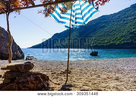 Sea And Sandy Vlychada Beach At Sunny Day. Tranquil Scene. Dyllic Relaxation Place In Greece.