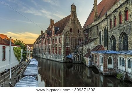 The Sint-jan Hospital In The Evening Light, Another Great Location To Visit For A Citytrip In Bruges