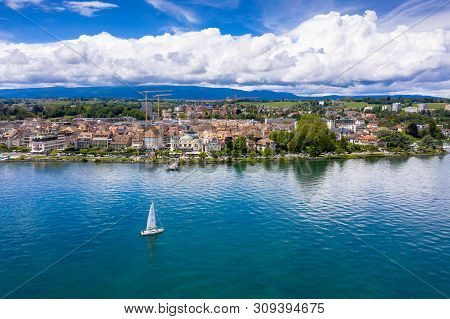 Aerial View Of Morges City Waterfront In The Border Of The Leman Lake In  Switzerland