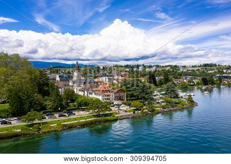 Aerial View Of Morges City Waterfront In The Border Of The Leman Lake In  Switzerland