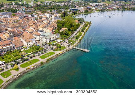 Aerial View Of Morges City Waterfront In The Border Of The Leman Lake In  Switzerland