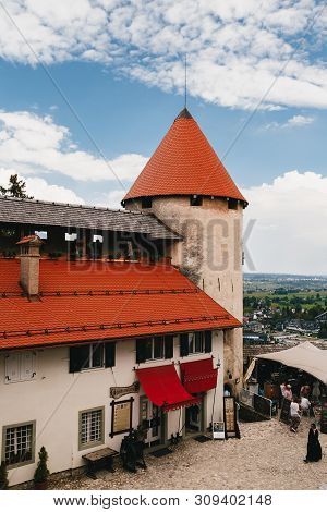 Bled, Slovenia - September, 8 2018: View Of The The Bled Castle Courtyard, Tower And Castle Building