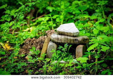 A Magic Dolmen Or Table-stone Covered By Moss In Russian Mountain Forest.