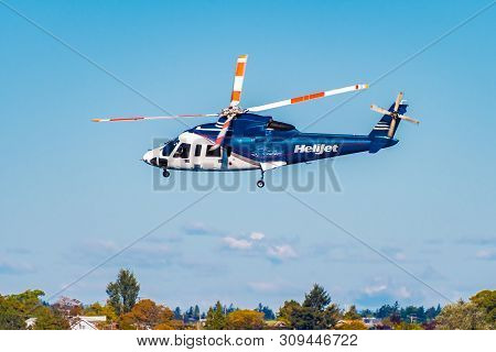 Victoria, Canada - October 02 2017: Helijet International Helicopter (cfzaa - Sikorsky S76) In Fligh