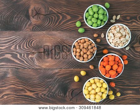 Assortment Of Different Peanuts Snack For Beer, Wine, Party Bar. Salted Peanuts, Peanuts In Coconut 