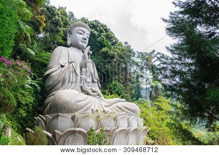 The Iconic View Of Large Stone Buddha Statue At Chin Swee Caves Temple, The Taoist Temple In Genting