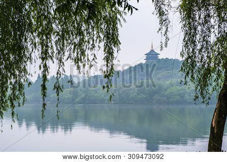 View Of Leifeng Pagoda At The West Lake In The Morning, Where Is A Freshwater Lake In Hangzhou, Zhej