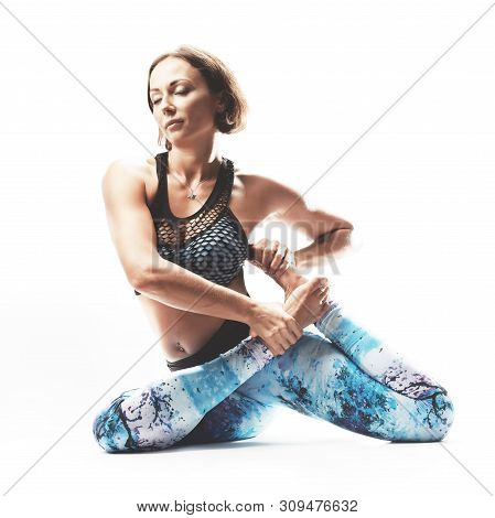 Beautiful Young Woman Practicing Yoga On White Background