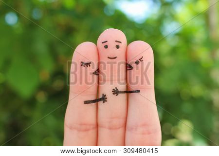 Fingers Art. Concept Of Girls Kisses Boy On Cheek.