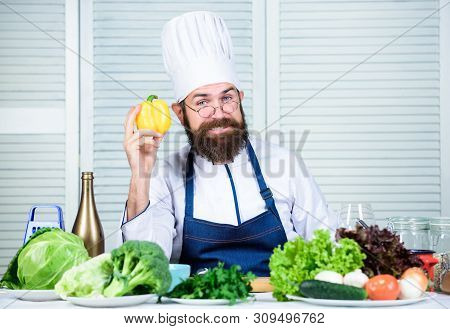 Right Nutrition. Healthy Food Cooking. Bearded Man Cook In Kitchen, Culinary. Chef Man In Hat. Secre