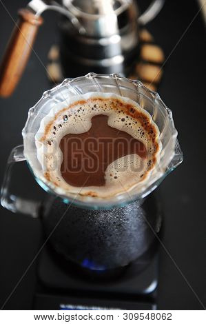 Alternative Coffee Brewing. Transparent Glass Pour Over Dripper V60 With Paper Filter Top View. Goos