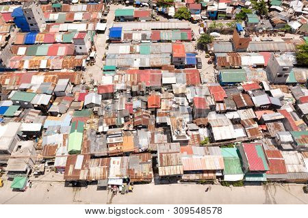 Streets Of Poor Areas In Manila. The Roofs Of Houses And The Life Of People In The Big City. Poor Di