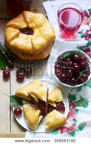 Traditional Homemade Romanian And Moldovan Pies - Placinta, Served With Wine. Rustic Style.