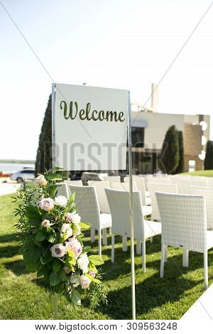 Beautiful Outgoing Wedding Set Up. Romantic Wedding Ceremony , Wedding Outdoor On The Lawn Water Vie