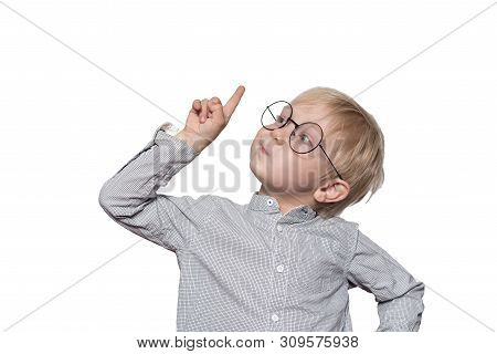 Portrait Of A Cute Blond Boy With Big Glasses. Finger Pointing Up. Isolate