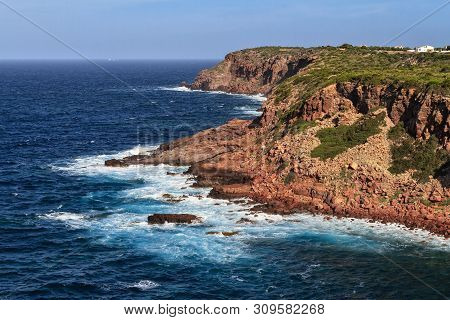 Mezzaluna Cliffs In San Pietro Island, Sardinia, Italy