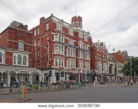 Southport, Merseyside, United Kingdom - 27 June 2019: People Walking Past The Historic Scarsbrick Ho