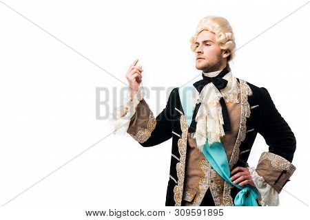 Pompous Victorian Gentleman In Wig Standing With Hand On Hip And Gesturing Isolated On White