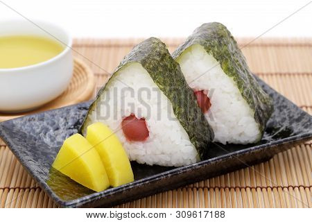 Onigiri, Japanese Food, Japanese Rice Ball, Rice Triangle With Nori And Umeboshi