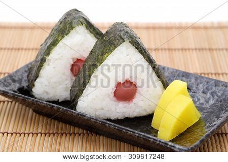 Onigiri, Japanese Food, Japanese Rice Ball, Rice Triangle With Nori And Umeboshi