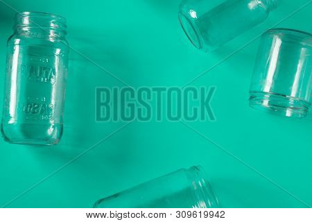 Isolated Glass Jars, No Lids Flat, Teal Mint Green Background, Copy Space Room