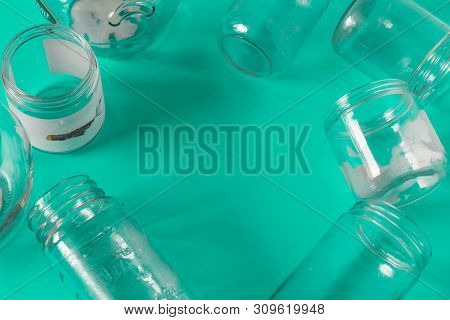 Isolated Glass Jars, No Lids Flat, Teal Mint Green Background, Copy Space Room