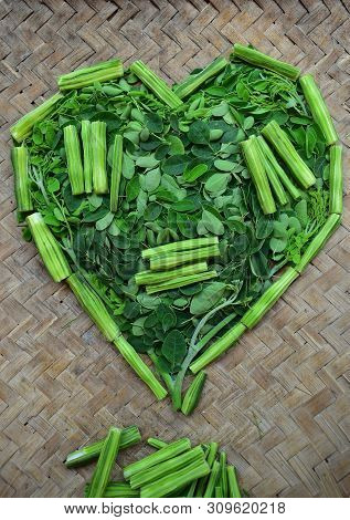 Moringo Tree Leaves And Drumsticks Fruits Of This Plants