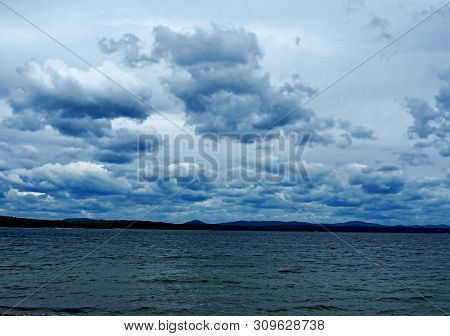 Heavy Gray Clouds Over The Lake On A Cloudy Evening, The Southern Urals, Lake Uvildy