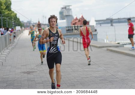 Dnipro, Ukraine - June 08, 2019: Vidensek David Running On An City Embankment During Of The 