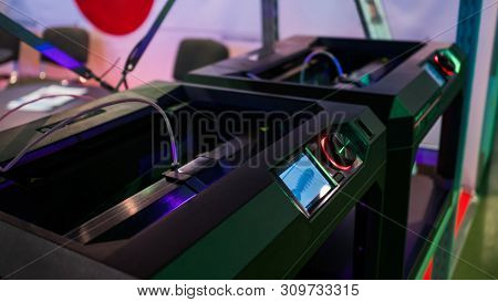 Print Head Of 3d Printer Machine During Work At Modern Scifi Technology Exhibition. 3d Printing, Add