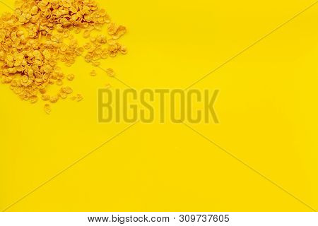 Cereals, Oatflakes And Cornflakes For Healthy Breakfast On Yellow Background Top View Mock Up
