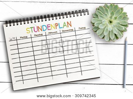 Top View Of Class Schedule Or Timetable Template With German Word Stundenplan On Notepad Against Rus