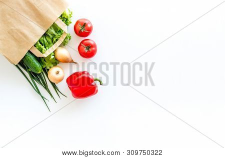 Healthy Food With Fresh Vegetables In Paper Bag On White Background Top View Space For Text